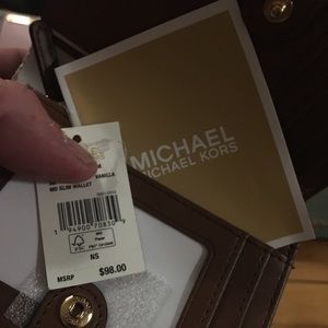 Michael kors wallet.   New with tags
